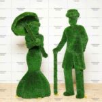 Топиари композиция светская встреча №3-1 (леди с зонтиком, джентельмен) - газон Deluxe