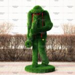 Топиари музыкант, саксофонист Гарретт - газон Deluxe