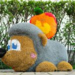 Топиари ежик с яблочком - газон Есо